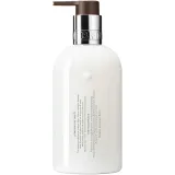 Лосьон для рук «флердоранж, франжипан и ваниль» Molton Brown Flora Luminare Hand Lotion, 300 мл. - вид 2