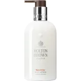 Поживний лосьйон для тіла «мандарин, боби тонка та тепла амбра» Molton Brown Neon Amber Body Lotion, 300 мл.